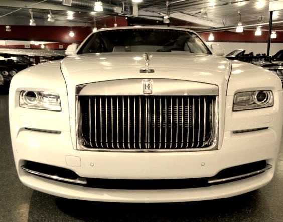 White Rolls Royce Grillwww.DiscoverLavish.com